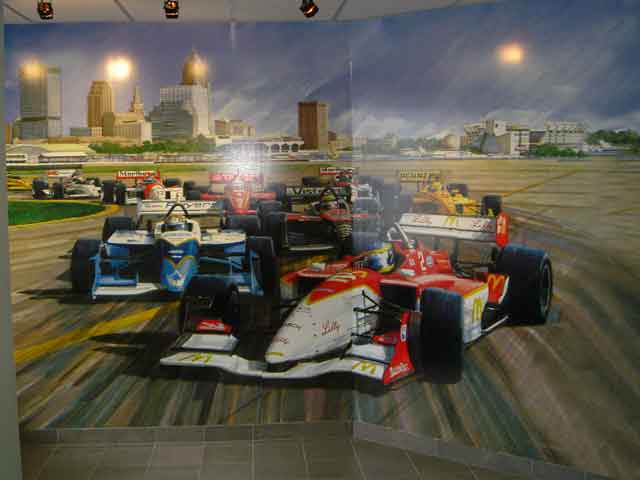 Printed building wrap showing racecar
